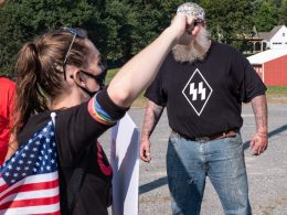 A counter protestor wearing a Nazi SS shirt shouts at Black Lives Matter marchers in Kingwood, West Virginia on September 12, 2020. Photo: Chris Jones/100 Days in Appalachia