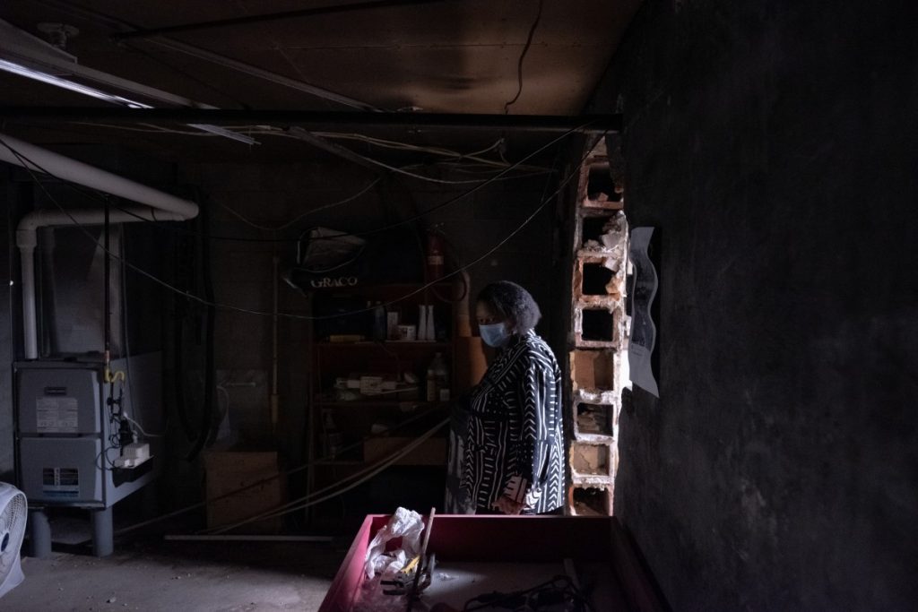 Dr. Norma Thomas stands near the entrance to a former tunnel in the basement of John Wesley AME Zion Church, which served as a stop along the Underground Railroad in Uniontown, Peennsylvania. Photo: Justin Hayhurst/100 Days in Appalachia