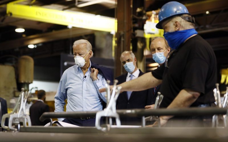 image of President Biden, Sen. Bob Casey (D-Pa) and McGregor Industries owner Bob McGregor talking with First Class Fitter Michael Phillips