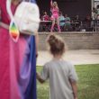 A child looks on at a drag event during the Vandergrift, Pennsylvania, 2023 PRIDE in the Park event. Photo: Ava O'Bien/100 Days in Appalachia