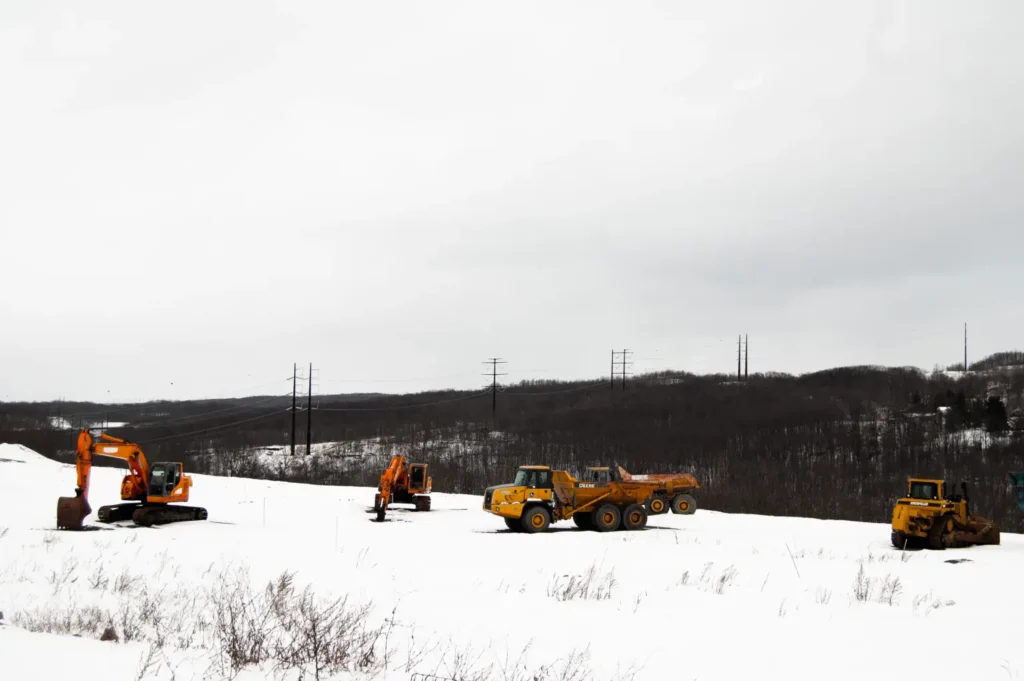 A high-voltage powerline runs behind a construction site in Archbald, Pennsylvania